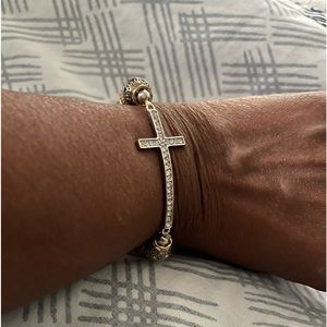 Stretchy bracelet w/ faux silver, gold and crystal beads.